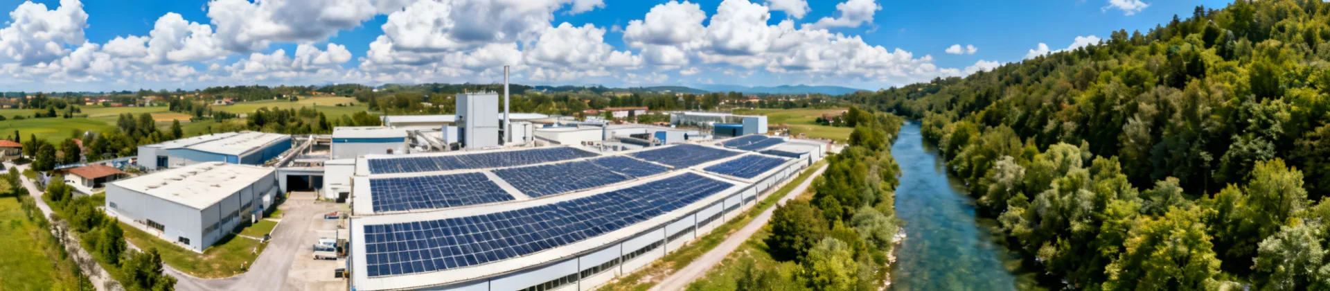 Breton sustainable manufacturing campus with renewable energy infrastructure and green surroundings